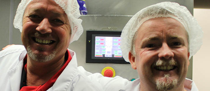 Chef and food assistant planning and preparing meals in our commercial kitchen