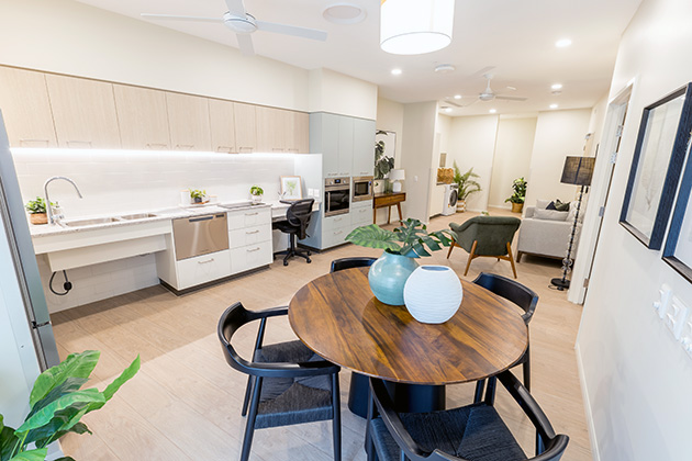 Integrated living and kitchen at NDIS specialist disability accommodation in Murrarie, South Brisbane