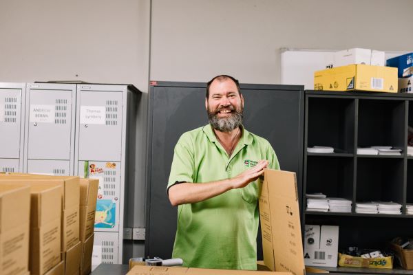 Worker at Wesley Industries, a printing and packaging service for people with disability