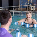 Retirees exercising at allied health hub Fulton Wellbeing Centre, in Sinnamon Park, Brisbane