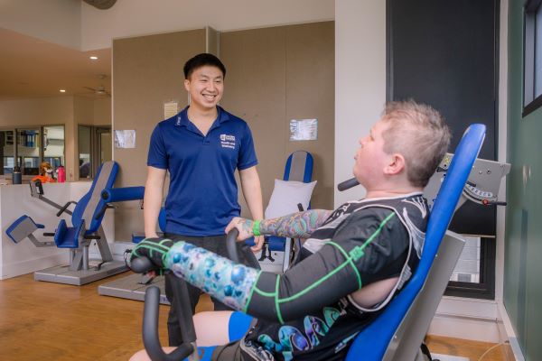 Allied health physiology session at the gym in a Wesley Mission Queensland community