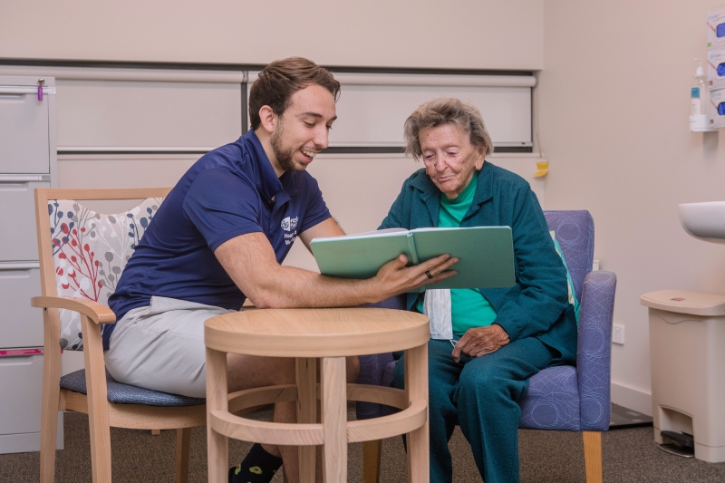Speech therapist with elderly client