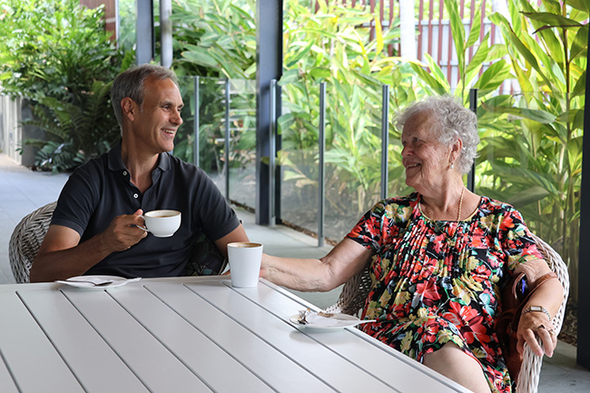 Mark and Catie having a coffee - Volunteer Visitor, Brisbane