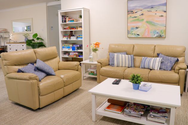 A bright and welcoming living area with two couches
