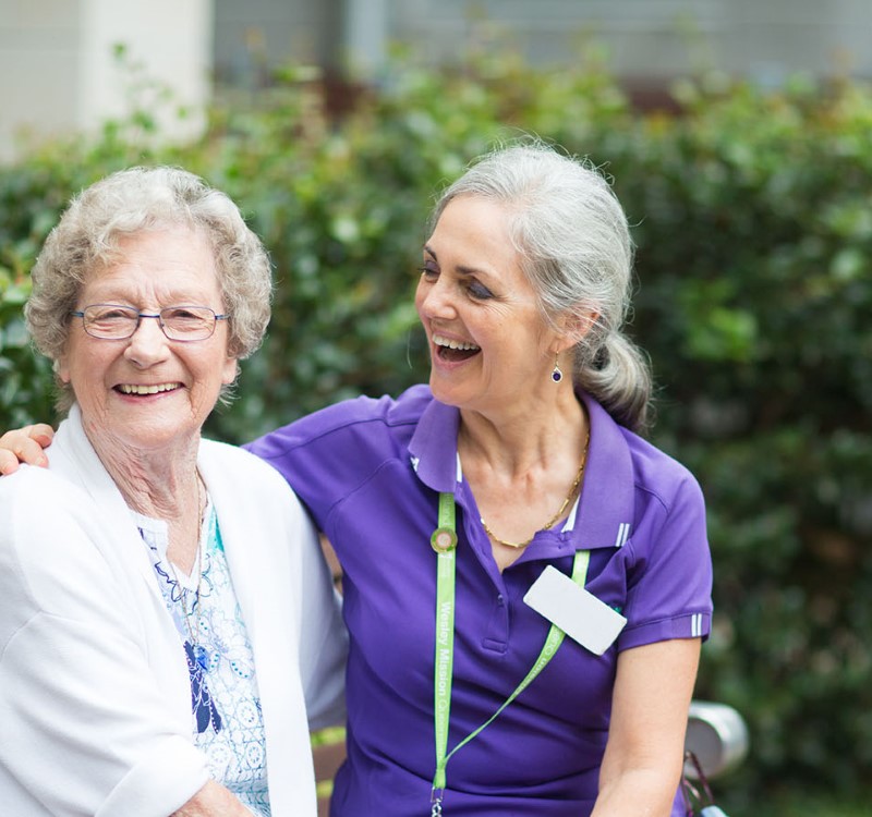 Margaret, Parkview aged care resident smiling with staff member