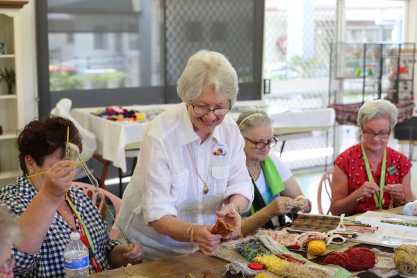 Wesley Mission Queensland respite and day programs at Hyland House Residents enjoying the Community craft activities