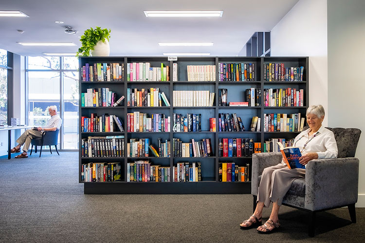 Rosemount library Couple reading in a library