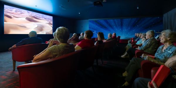 Residents watching a movie at Wheller on the Park cinema