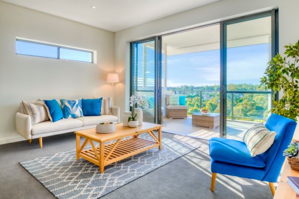 Bright and sunny lounge room with views at Wheller on the Park Bright and sunny lounge room with views out over balcony