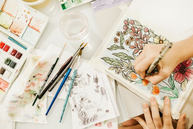 Artist drawing a floral picture