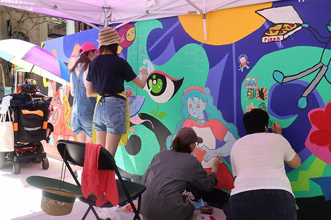 Wesley Arts live mural painting in Brisbane CBD