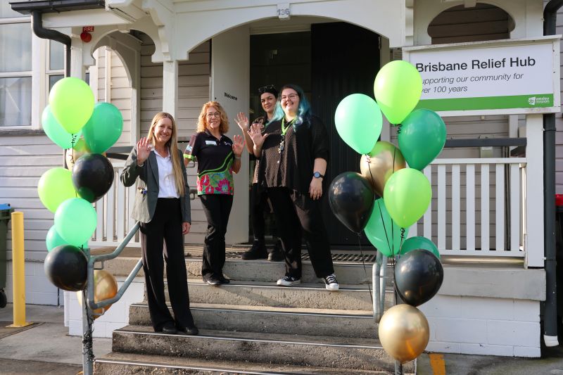 The Brisbane Relief Hub team on the steps of their new location in Fortitude Valley